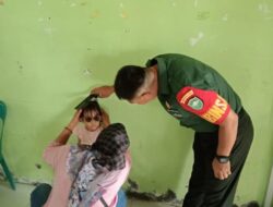 Babinsa Dampingi Pemeriksaan Kesehatan Balita di Posyandu Desa Perdamaian