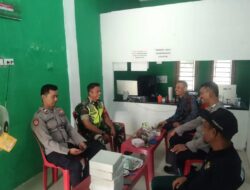 Sinergi Babinsa dan Bhabinkamtibmas Komsos dengan Perangkat Desa Tanjung Lipat II